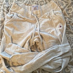 light grey champion sweatpants no strains and no holes